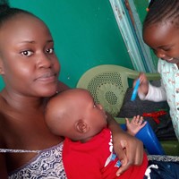 Willing Kenyan Female Au pair with 1year in child
